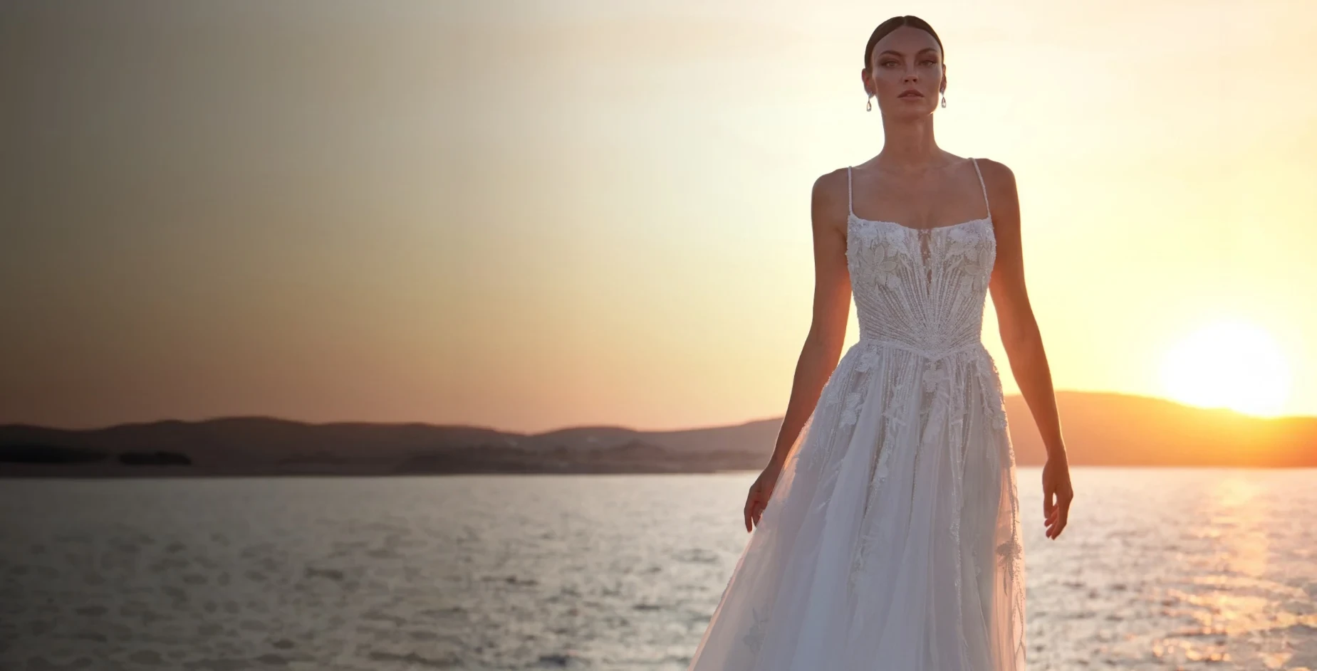 Photo of model wearing A Madison James gown. Desktop image