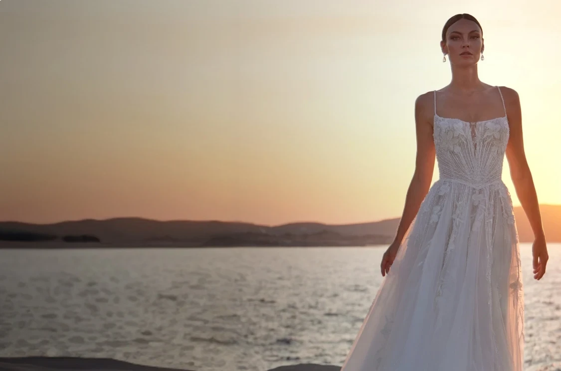 Photo of model wearing A Madison James gown. Mobile image