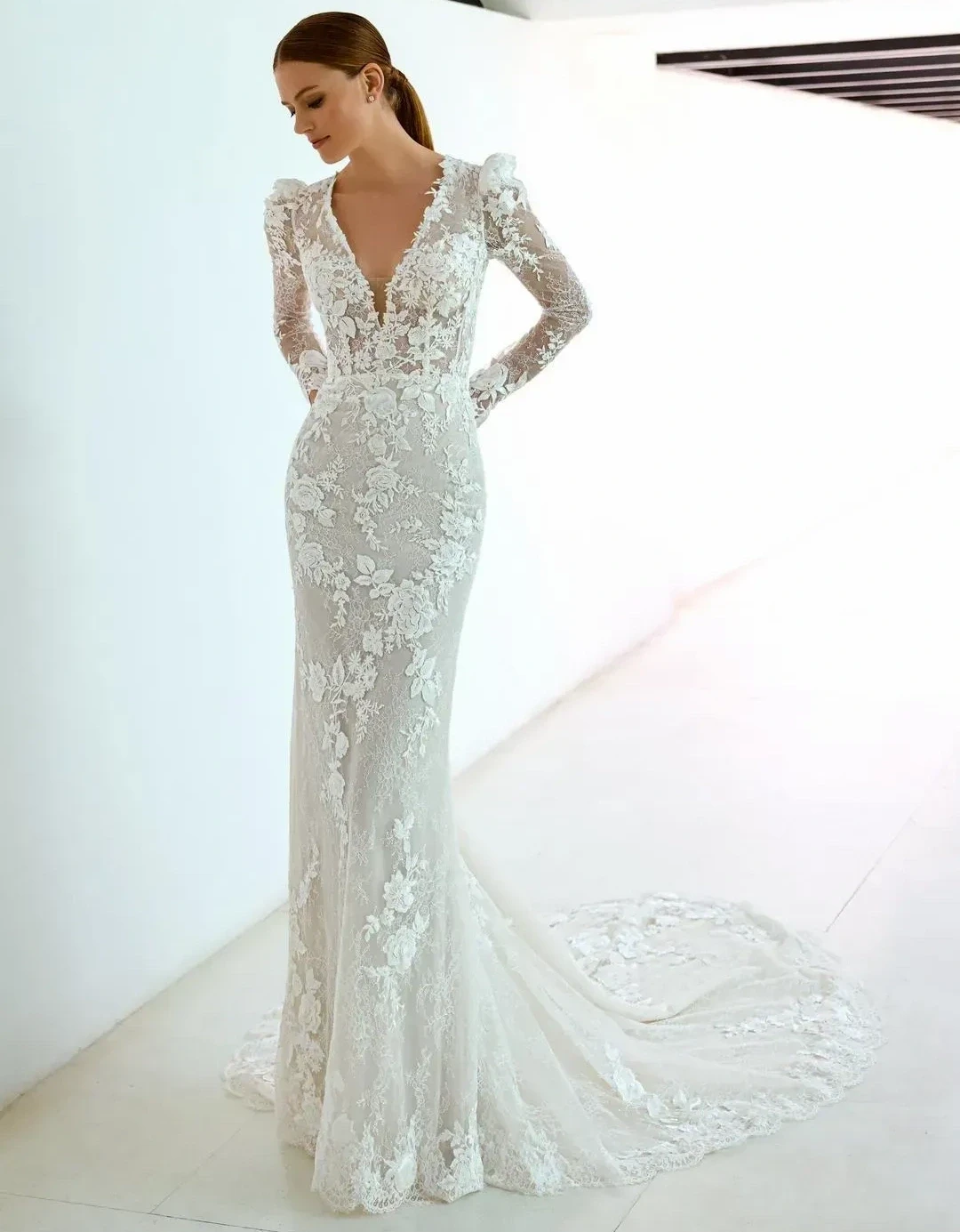 Model wearing a Long Sleeved Style gown. Desktop image